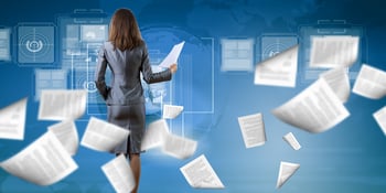 Back view of businesswoman holding papers in hands