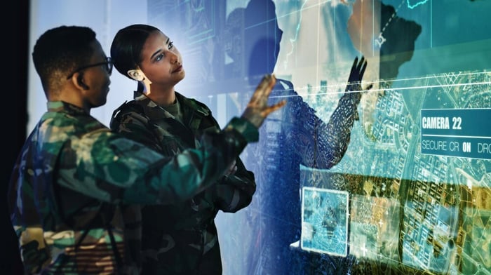 army members viewing maps