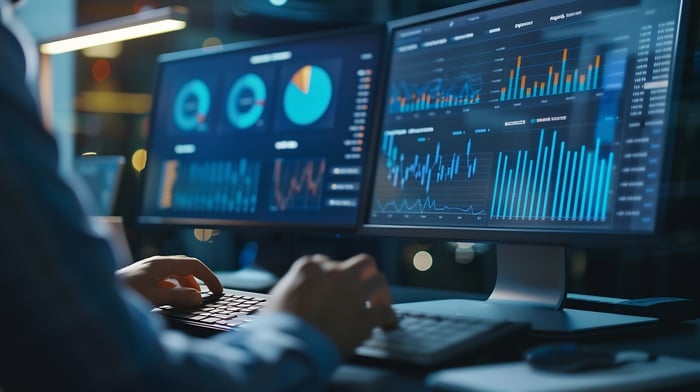 consultant using analytics software to improve kpis